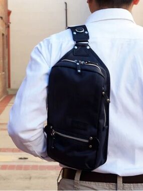 Harvest Label Urban Sling Pack in black with silver zippers